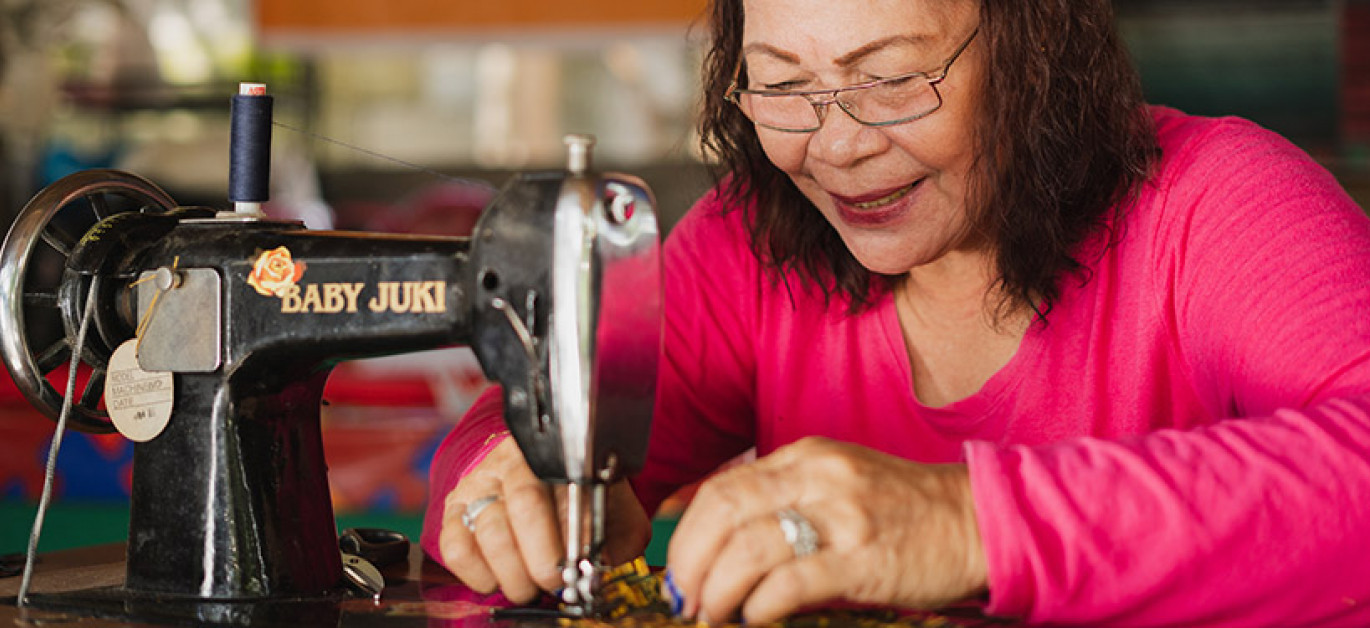 Philippino woman sewing