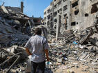 Gaza man watching distructions